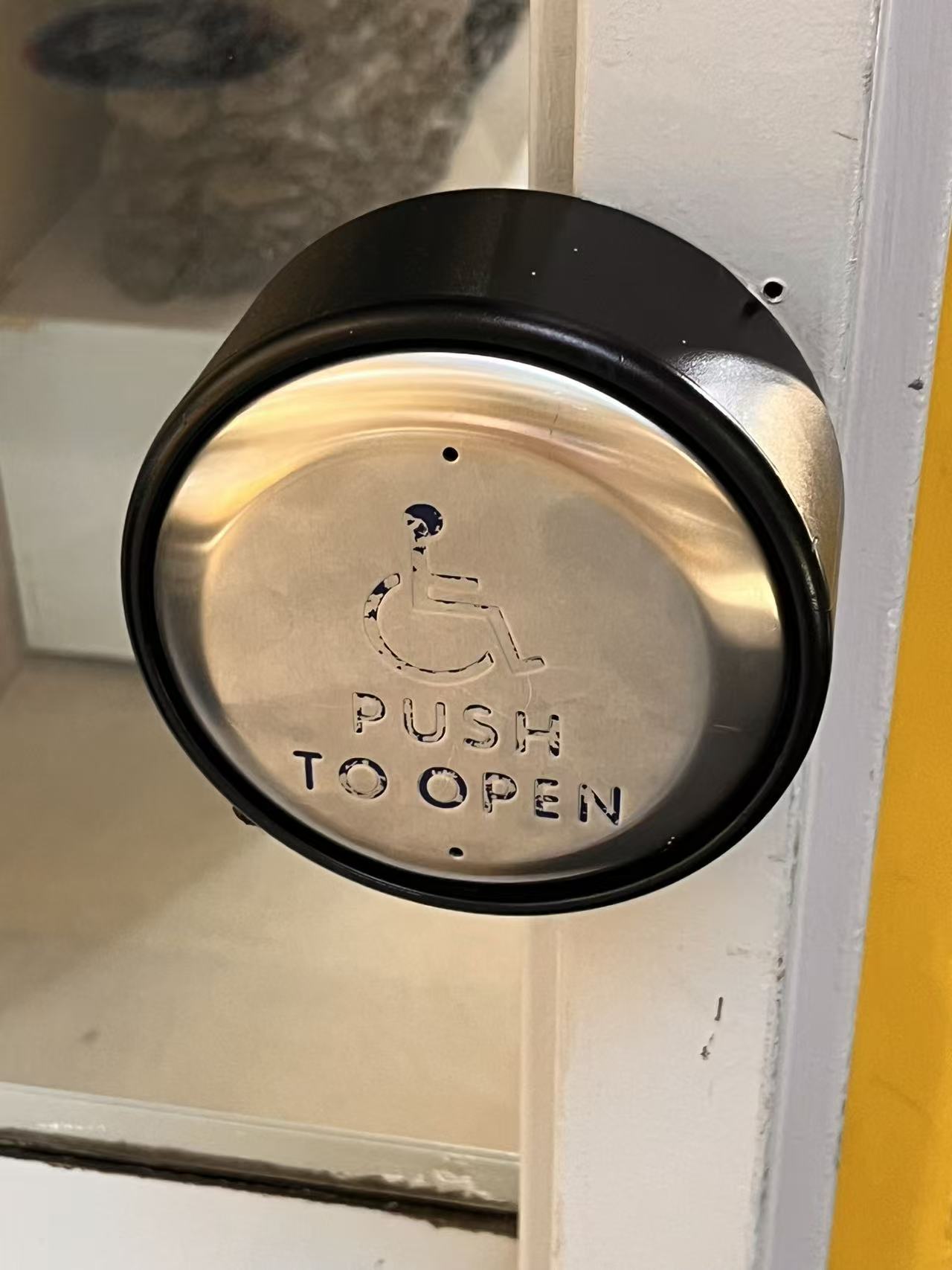 Accessible Door Button: The faceplate is constructed from 304 stainless steel, while the outer ring is made of ABS plastic. Stainless steel was selected for its wear and scratch resistance—qualities that are crucial for buttons installed in public spaces subject to frequent, repeated use. This material is rust-resistant, withstands local temperature fluctuations, is easy to clean, and is durable enough to resist damage. The primary function of the plastic housing is to secure the unit to the wall and provide electrical insulation for the internal circuitry.<a href='https://www.youtube.com/embed/tgbNymZ7vqY' target='_blank'><p>Project Video Link</p></a>